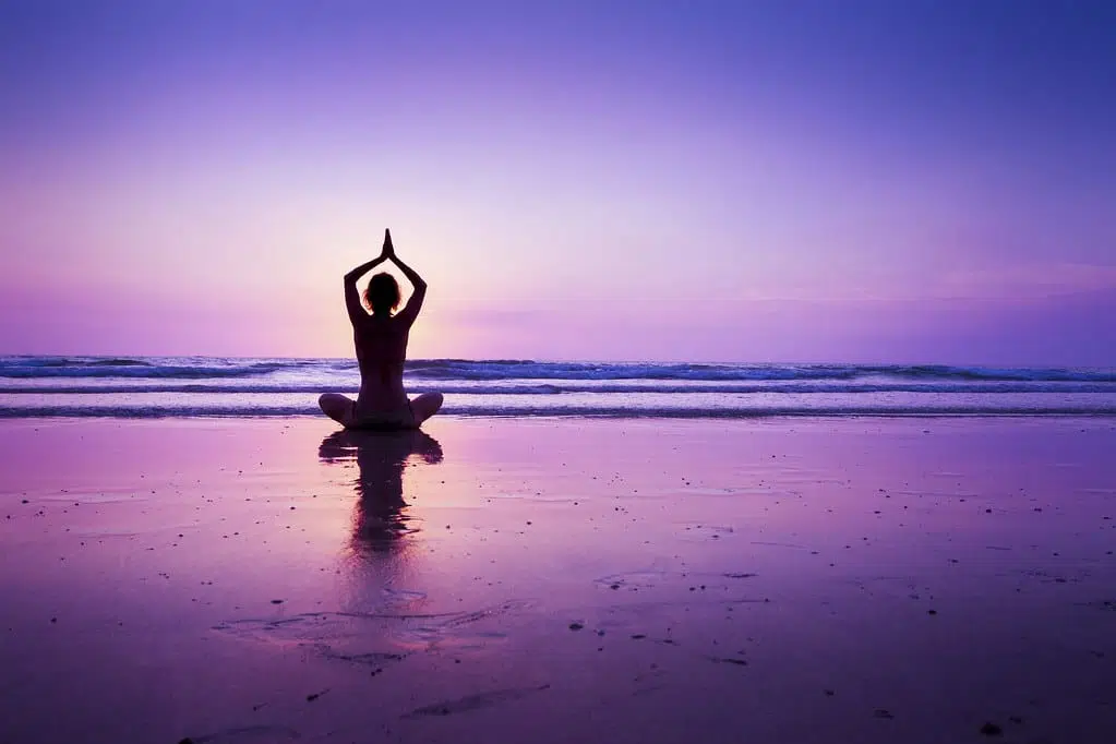 person doing you on beach for anxiety management