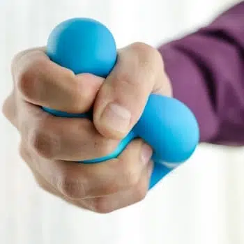 hand squeezing stress ball