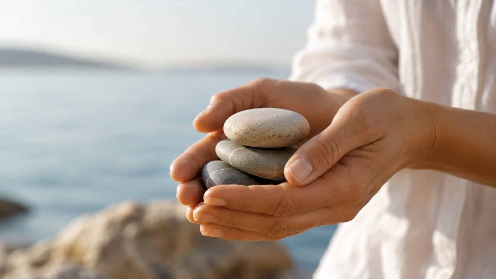 Hands holding natural materials as a symbol of calm and wellbeing